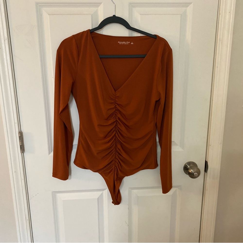 Abercrombie&Fitch. Terracotta Long Sleeve Bodysuit. Size L.